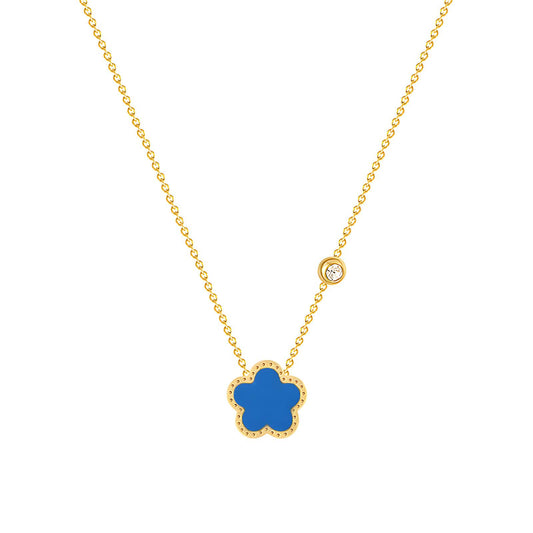 Elegant blue flower pendant necklace with gold chain, featuring a sparkling accent, perfect for a sophisticated look.