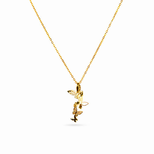 A studio shot on a white background displays the Celeste Butterfly Necklace. This gold-toned necklace has a fine chain and a vertical arrangement of four butterfly pendants, two of which are detailed with sparkling clear gemstones.