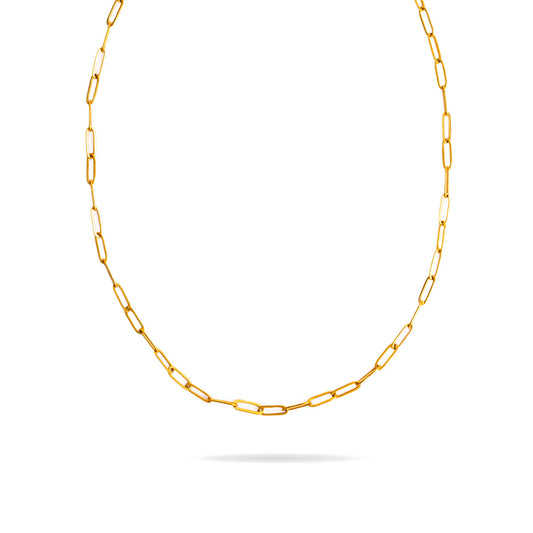 A studio shot on a bright white background displays the Serena Paperclip Necklace. The gold-toned necklace forms a gentle U-shape, highlighting its continuous chain of polished paperclip-style links.