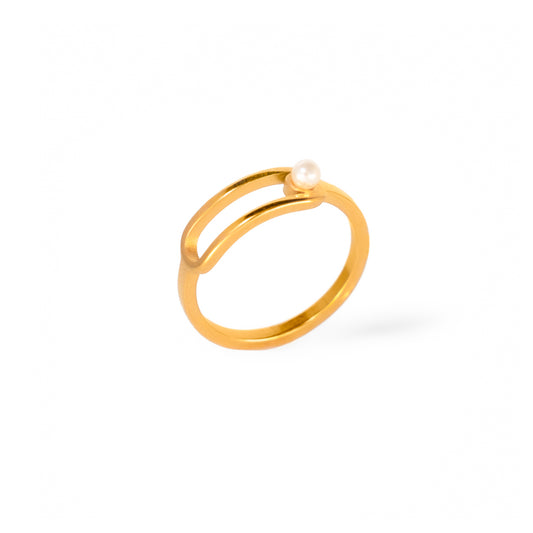 A studio shot on a bright white background displays the Anna Pearl Duo Ring. This gold-toned, open-ended ring has a double-band design, with a single white pearl nestled between the two bands at the top.
