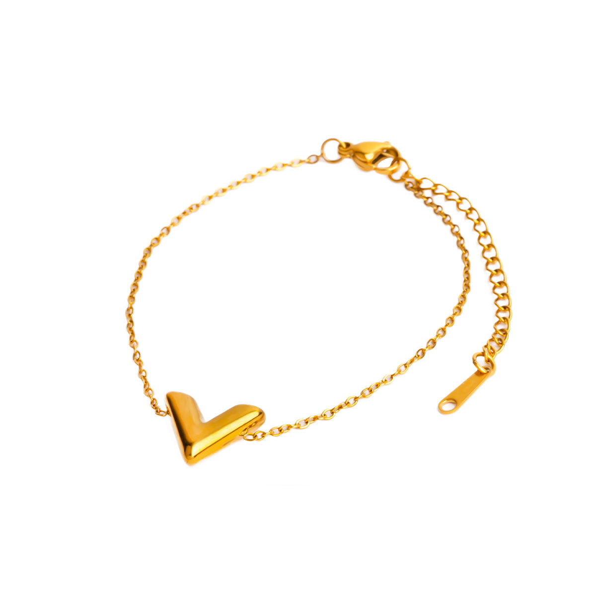 A studio shot on a clean white background displays the Avani Arrow Bracelet. The bracelet, with its delicate gold chain, forms a loose circle, centered by a three-dimensional, polished V-shaped charm.
