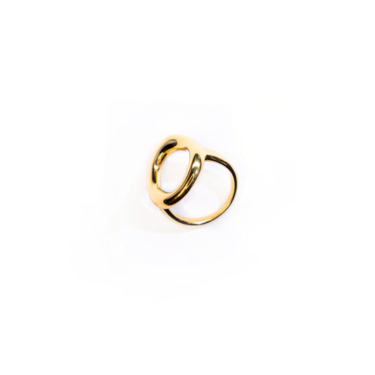  A studio shot on a pristine white background displays the Elara Infinity Ring. This gold-toned ring features a polished, fluid, and intertwining design that forms an abstract infinity or figure-eight shape, with an open, adjustable band.