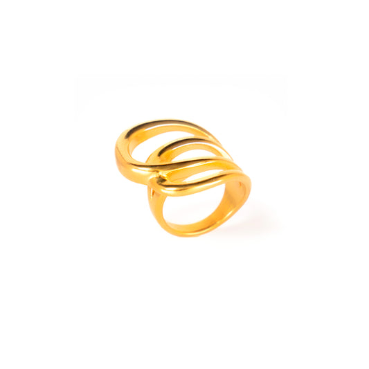 A studio shot on a bright white background displays the Elara Wave Ring. This gold-toned ring features a bold, multi-band design that includes smooth bands gracefully intertwining to form a fluid, wave-like shape.