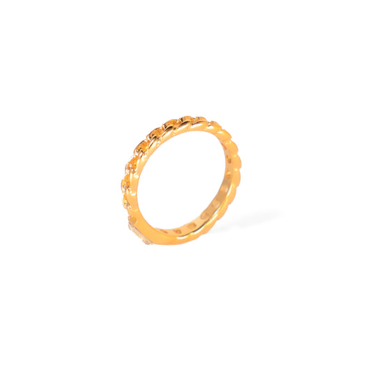 A studio shot on a clean white background displays the Luna Sparkle Ring. This gold-toned ring has a thin, twisted or rope-like band that is adorned with small, brilliant clear gemstones around its perimeter.