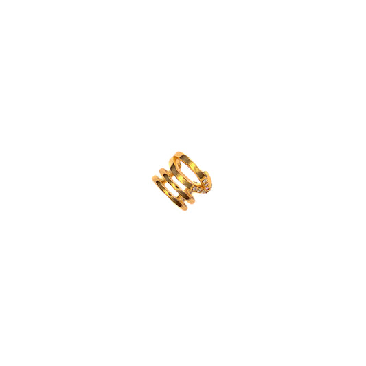 Glistening against a stark white backdrop, the Nova Sparkle Ear Cuff coils elegantly, showcasing its brilliant gold tone. This intricate accessory features layered bands, some smooth and others set with delicate, sparkling stones, designed to embrace the ear with effortless glamour.