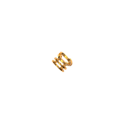 Glistening against a stark white backdrop, the Nova Sparkle Ear Cuff coils elegantly, showcasing its brilliant gold tone. This intricate accessory features layered bands, some smooth and others set with delicate, sparkling stones, designed to embrace the ear with effortless glamour.