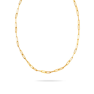 A studio shot on a bright white background displays the Serena Paperclip Necklace. The gold-toned necklace forms a gentle U-shape, highlighting its continuous chain of polished paperclip-style links.